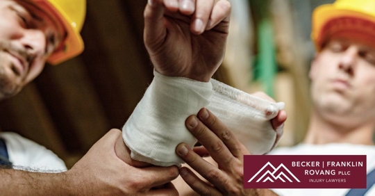 construction worker with injured arm