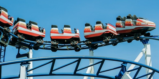 A train of cars on a roller coaster